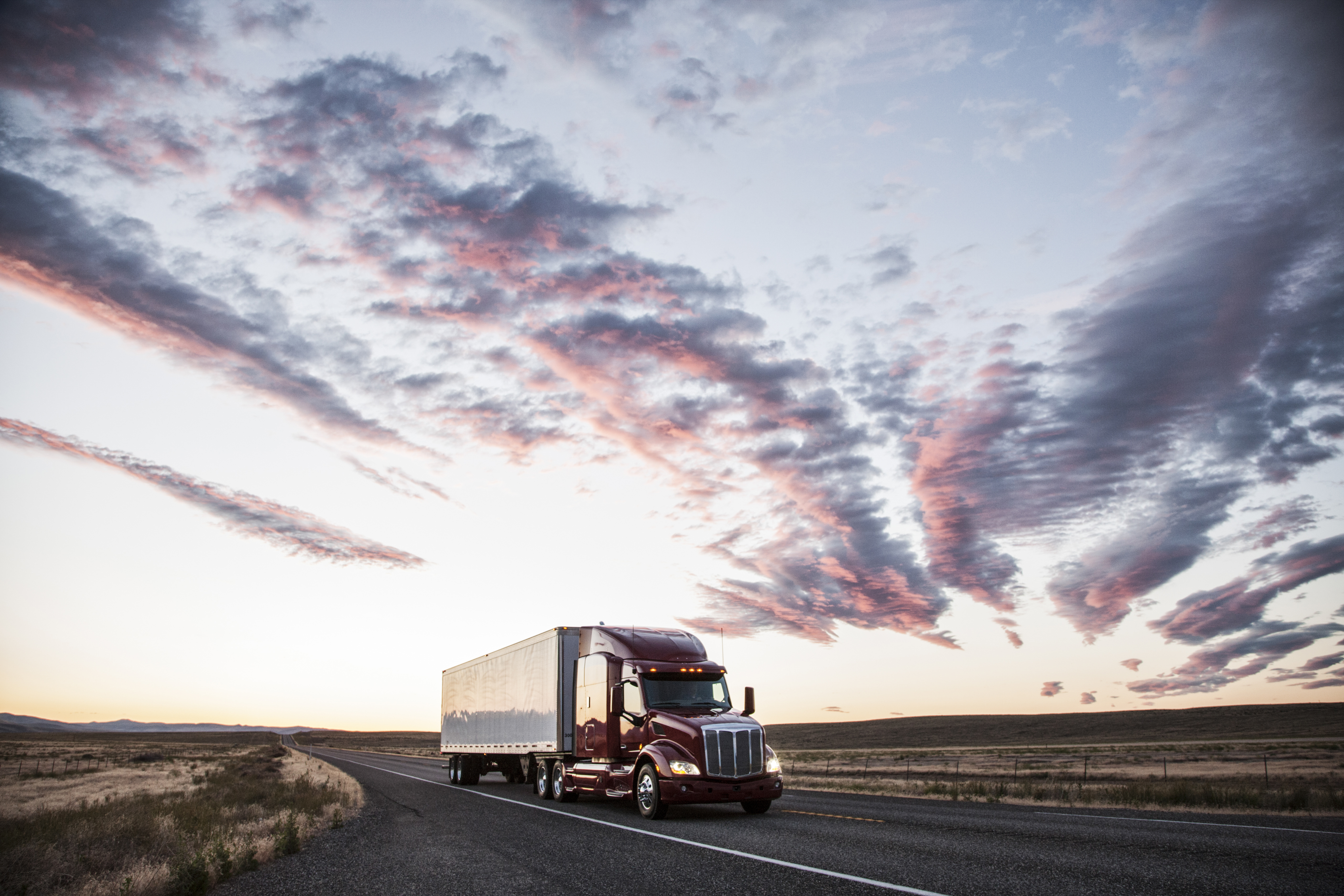3-4-front-view-of-a-commercial-truck-on-the-road-2025-04-05-02-36-30-utc